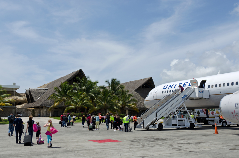 Punta Cana International Airport terminal and arriving passengers